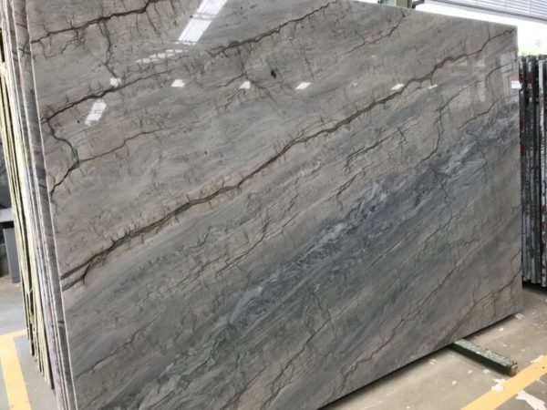 A slab of grey marble with a large amount of gray on it.