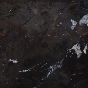 A close up of the dark marble surface