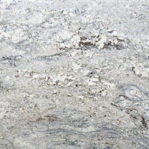 A close up of the surface of a white stone
