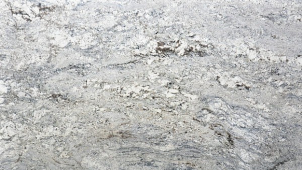 A close up of the surface of a white stone