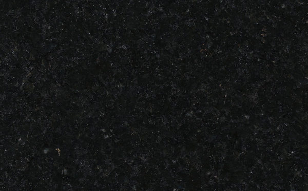 A black granite surface with some small white dots.