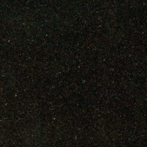 A black granite surface with some white dots