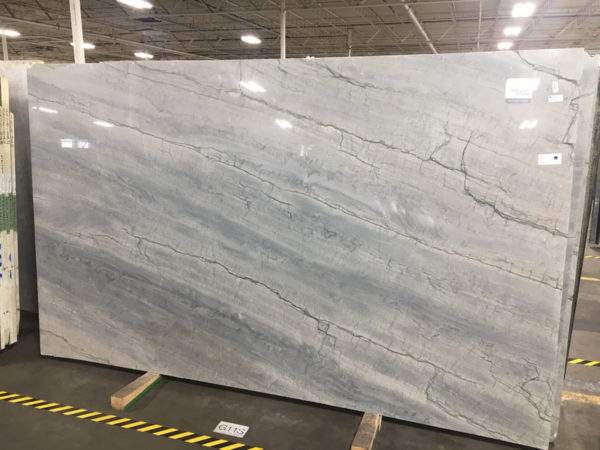 A slab of marble that is in a warehouse.
