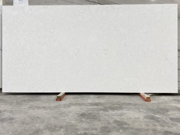 A white slab of marble in a warehouse.