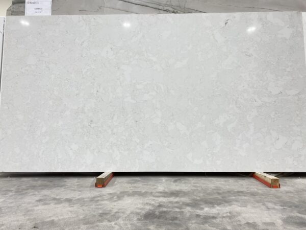 A slab of white marble in a warehouse.