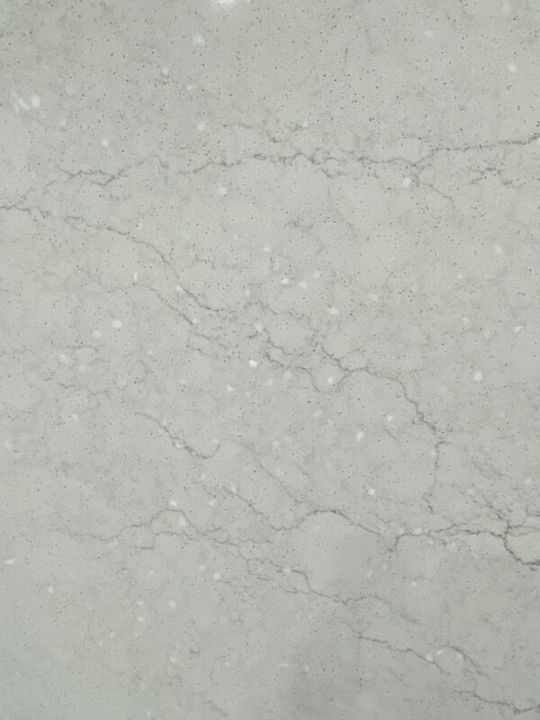A close up of the surface of a white marble slab.