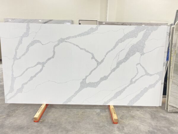 A slab of white marble with grey veins.
