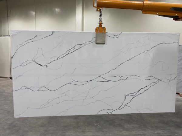 A slab of white marble with orange accents.