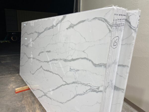 A white slab of marble with a crack in it.