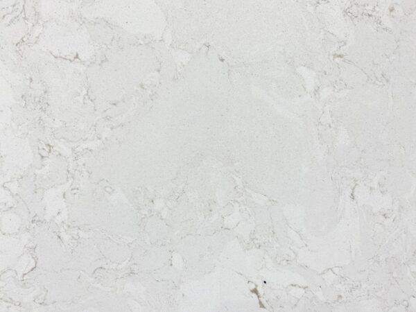 A white marble surface with some small rocks