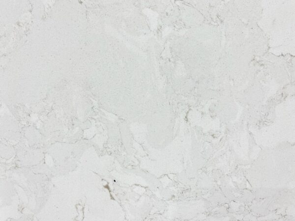 A white marble surface with some small cracks.