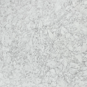 A white marble surface with some gray and black spots