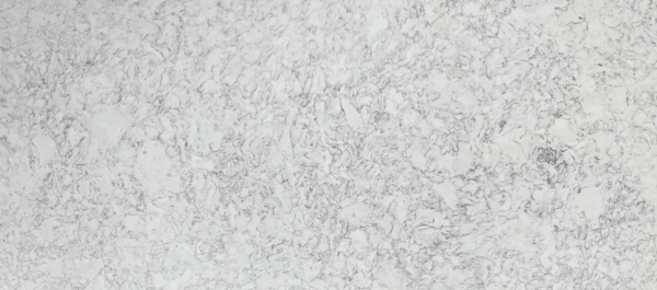 A white marble surface with some gray and black spots