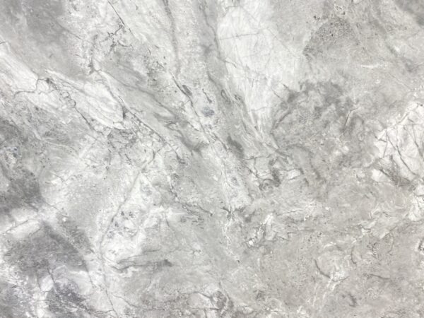 A close up of the surface of a white marble.