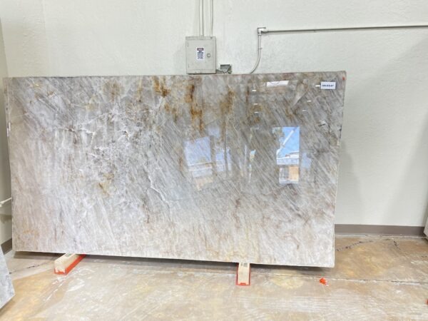 A slab of marble that is sitting on the floor.