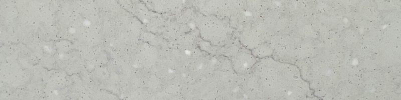 A close up of the surface of a white marble slab.