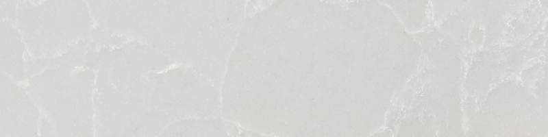 A white marble surface with some gray spots