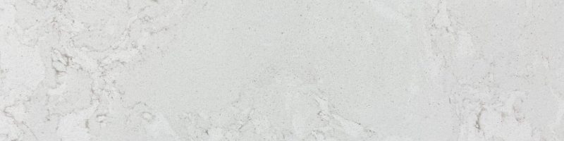 A white marble surface with some small rocks