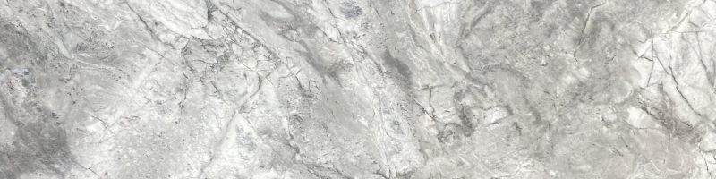 A close up of the surface of a white marble.