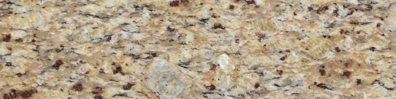 A close up of the granite counter top.