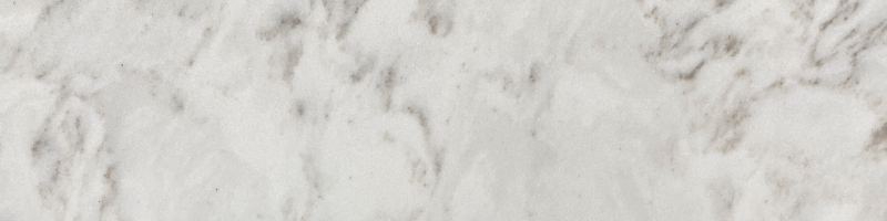 A white marble surface with some small bumps on it